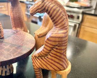 Hand-carved African seated party animals