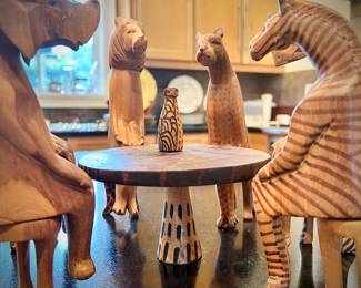 Hand-carved African seated party animals