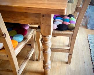 Pine dining table and six high-back chairs with chair pads