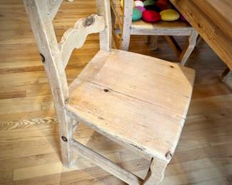 Pine dining table and six high-back chairs with chair pads