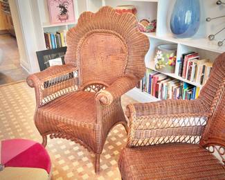 Twin wicker fan arm chairs and upholstered foot stools
