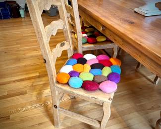 Pine dining table and six high-back chairs with chair pads