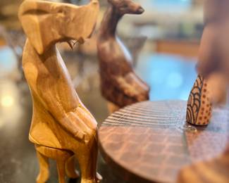 Hand-carved African seated party animals
