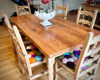 Pine dining table and six high-back chairs with chair pads