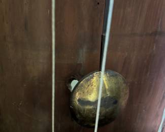 knot hole in back of clock