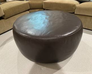   McCreary Modern leather ottoman/coffee table  15"h x 36" diameter 9
