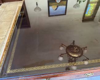 detail of gilt decorated leather top