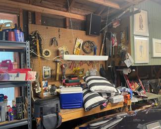 Everything in the garage is for sale! Lots of tools, lawn care equipment, wooden ladders and more.