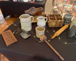 Another close up of rustic crockery, step ladder, irons and other vintage items