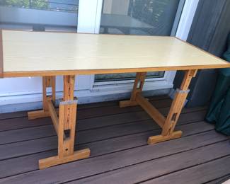1970s adjustable height pine & laminate work table by Ole Pira + Kurt Hafeli for Laukaan, Puu (Finland)  Top is reversible & can also be angled for use as a drafting table. Top is 27” x 59”, height as shown 28”. 