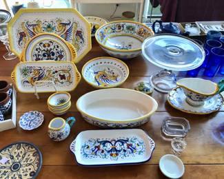 Deruta Italian pottery serving pieces (plates, bowls, platter), glass cake stand