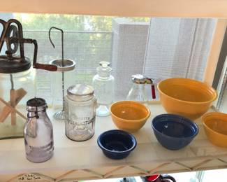 Vintage kitchen: Old Dandy butter churn, Wesson Oil mayo maker, Bauer mixing bowls, syrup pitcher with red Bakelite handle