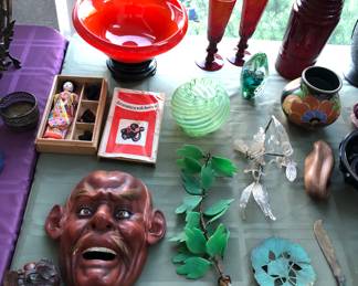 Japanese Meiji lacquer mask, Japanese doll with wigs, orange glass bowl (Northwood Chinese coral?), glass leaves, green swirl rose bowl, Sterno art glass paperweight