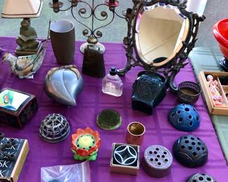 Flower frogs (purple one is Rookwood), ornate metal vanity mirror, tin candelabra