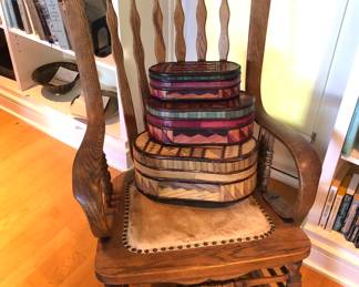 Antique oak rocker, colorful wooden nesting boxes