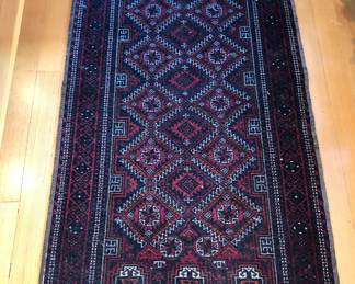Wool rug, made in Iran (33” x 61”)