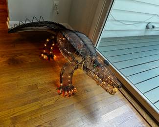 plug him in, he wags his tail!! and lights up... coolest 'Gator ever!!!!