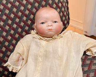 Antique bisque baby doll with sleep eyes