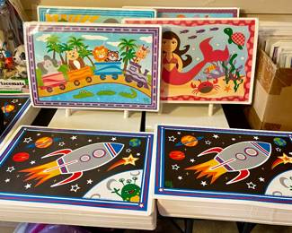 These place mats are adorable! They are wipe clean and can be used with dry erase crayons. Design on the fromt is the "lined" design on the back. THese will be a life saver this summer and we have a bunch! $2 each and cheaper in bundles.