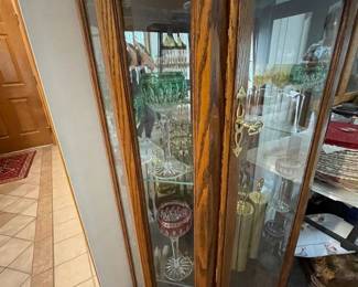 . . . the magnificent grandfather clock is also part curio cabinet