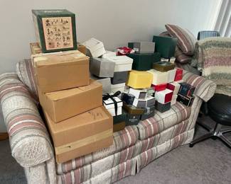 . . . upholstered couch stacked with Waterford crystal!