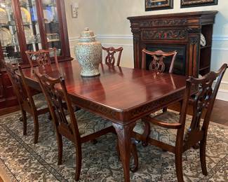 Pennsylvania, beautiful table with six chairs and coordinating curio hutch