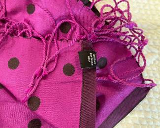 This is a close picture of the magenta silk scarf