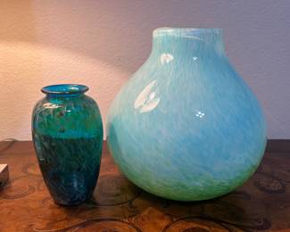 The smaller glass face is signed ANDRES & CHAPMAN.
The larger light blue vase is from pier one.