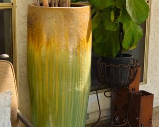 Tall, dramatic planter with bamboo staves