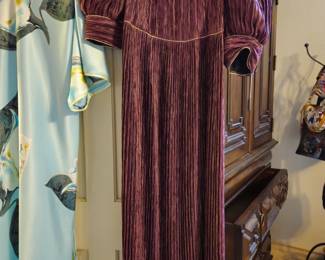 Mary McFadden dress in a luscious shade of blackberry. Iconic pleated silk fabric. Size Medium