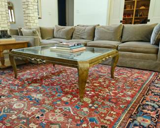 Beautiful Persian rug and bronze finish coffee table are for sale. Sofa is not for sale. Home buyer will keep.
