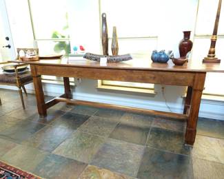 9' pine table can be used in the dining room or as a dramatic side table