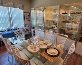 Beautiful dining room table with 8 chairs and 5-piece china cabinet. Will sell separately.   