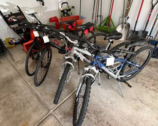 4 Bikes: 2 Fuji Absolute 1.9 Road Bikes and 2 Giant Boulder Mountain Bikes