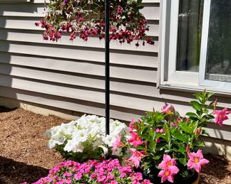 We have a Great Selection of Beautiful Potted Flowers, Shepherd Hooks, Bird Bath and Planters.