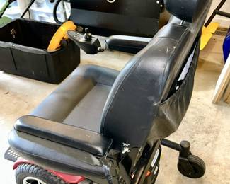 Motorized wheelchair, lightly used, side view