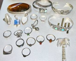 Sterling silver jewelry, bracelets, rings, pins, large amber pin