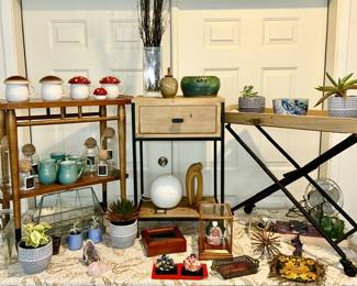 Serving carts (one on right sold), Side table (sold), signed, art, pottery, planters, mushroom coffee  cups (sold) and timer, Oriental dolls, etc.