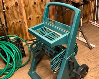 Outside storage building - Hose Reel