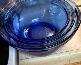 Three pieces of blue Anchor Hocking