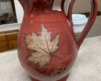 Lovely red & leaf motif pottery pitcher - very nice