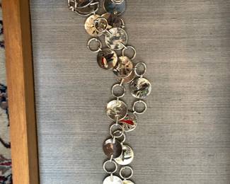 Navajo belt - each medallion is a different bird.  signed by the artist