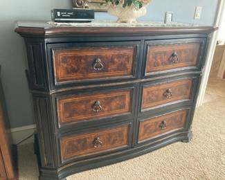Bedroom dresser has drawer converts to entertainment center