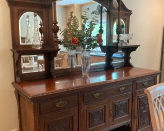 Antique tall Federal Style heavy carved sideboard with beveled mirrors