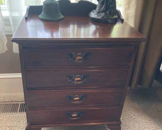Antique table converts to music stand