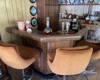 Corner bar with bar stools. 