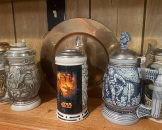 30+ steins commemorating Star Wars, rescue workers, athletics, and more. 