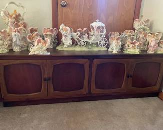 Angels stop a super cool record cabinet. 