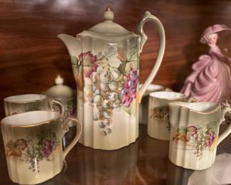 Vintage teapot and cups with cream and sugar. 