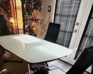 4 nice mermaid chairs plus nice dining room table